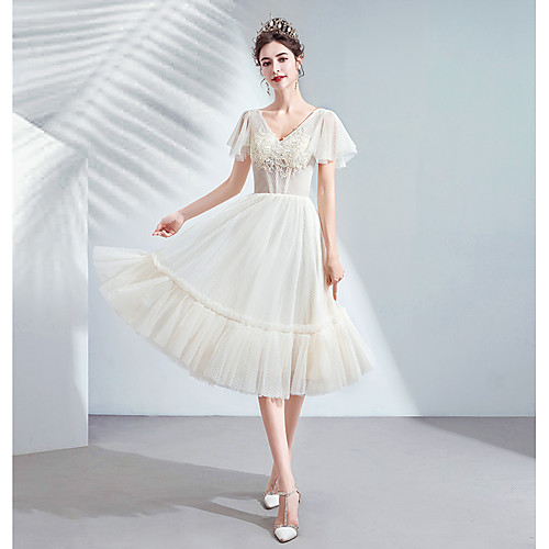 A-Line V Neck Tea Length Tulle Cocktail Party Dress with Beading / Appliques by LAN TING Express
A-Line V Neck Tea Length Tulle Cocktail Party Dress with Beading / Appliques by LAN TING Express