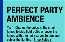 Change the bulbs in the small lamps to red light bulbs or cover the lamps with thin red scarves to dim and colour the lighting. 